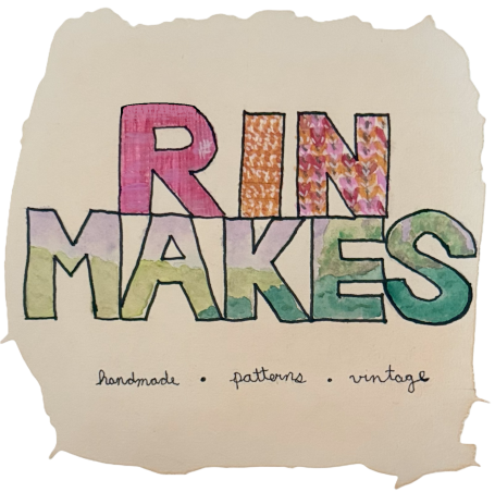 Logo with block letters. RIN MAKES in block letters, colored in with pink, orange, purple, and green. Below in italics are the words handmade, patterns, vintage.